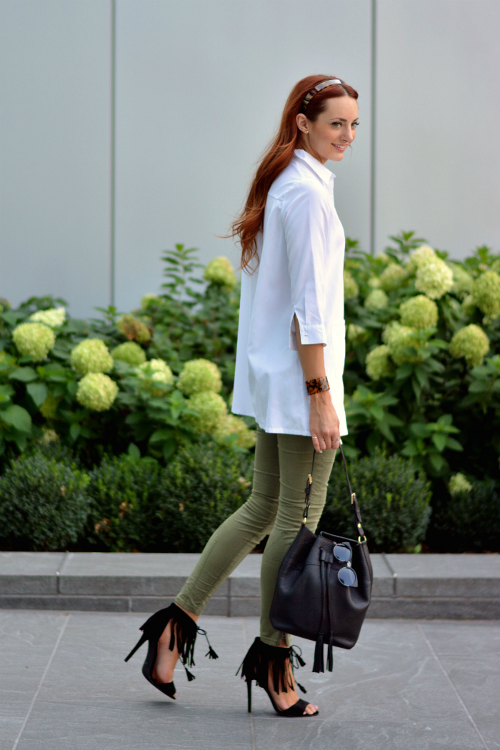 oversize shirt with bucket bag and fringe heels